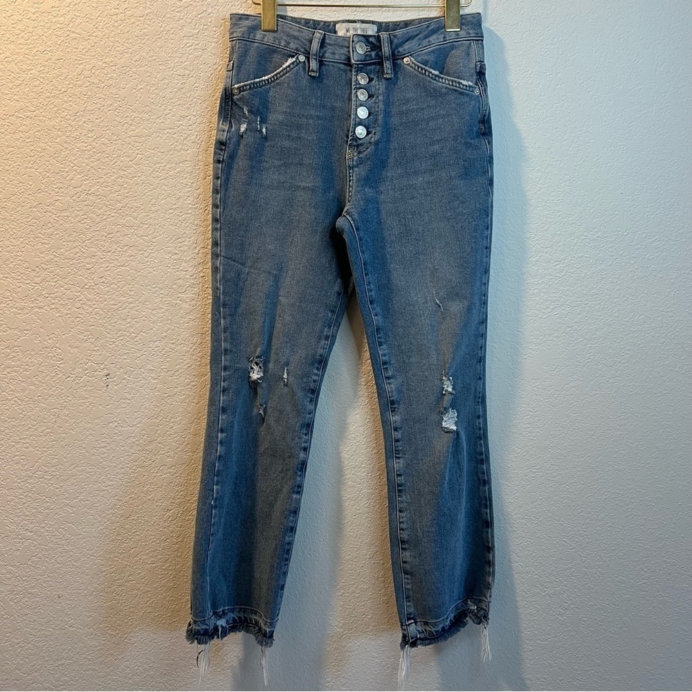 Women’s We the Free light wash distressed button closure skinny jeans size 25